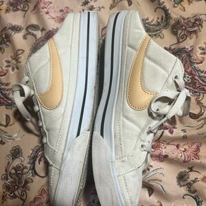 Nike Cream and Tan Mules.